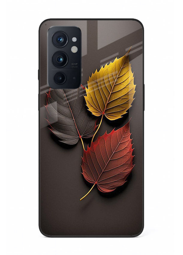 Autumn leaf artwork on OnePlus 9RT glass back cover with warm drifting tones.