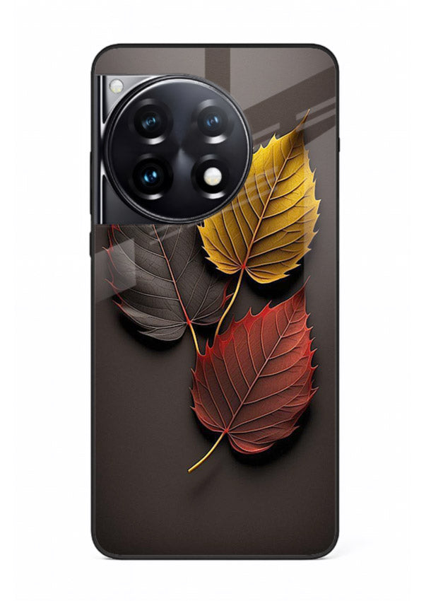 Autumn leaf artwork on OnePlus 12R glass back cover with warm drifting tones.