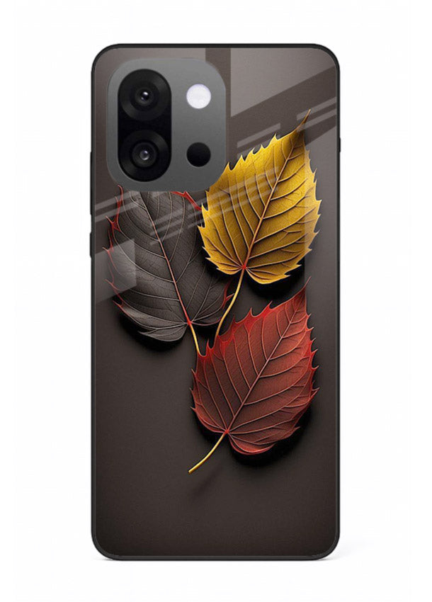 Autumn leaf artwork on OnePlus 13s glass back cover with warm drifting tones.