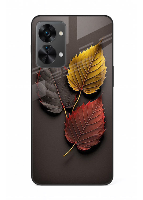 Autumn leaf artwork on OnePlus Nord 2T glass back cover with warm drifting tones.