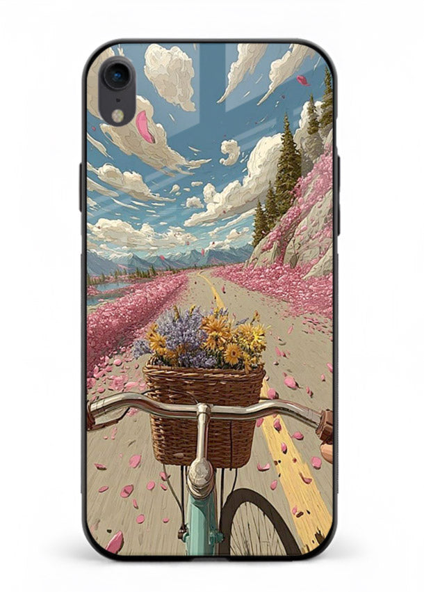 Bicycle with blossom-filled basket artwork on iphone xr glass back cover with soft scenic floral detailing.
