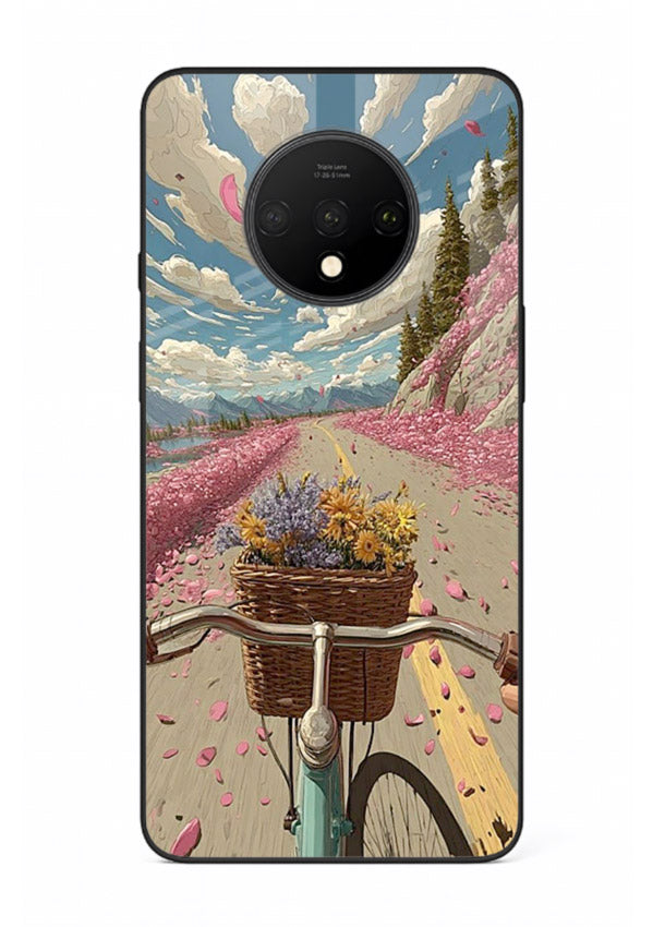 Bicycle with blossom-filled basket artwork on OnePlus 7T glass back cover with soft scenic floral detailing.