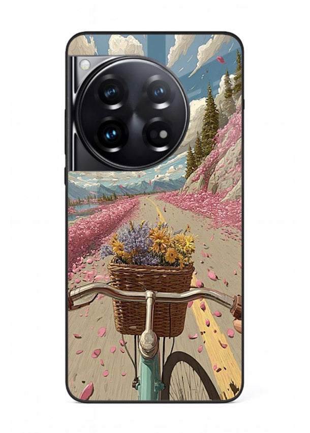 Bicycle with blossom-filled basket artwork on OnePlus 12 glass back cover with soft scenic floral detailing.