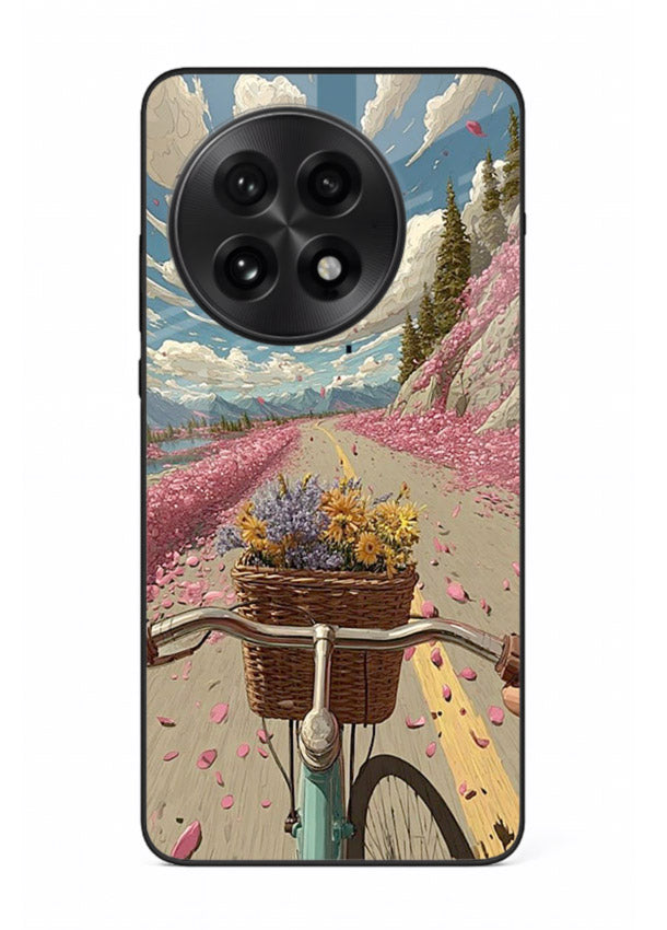Bicycle with blossom-filled basket artwork on OnePlus 13 glass back cover with soft scenic floral detailing.
