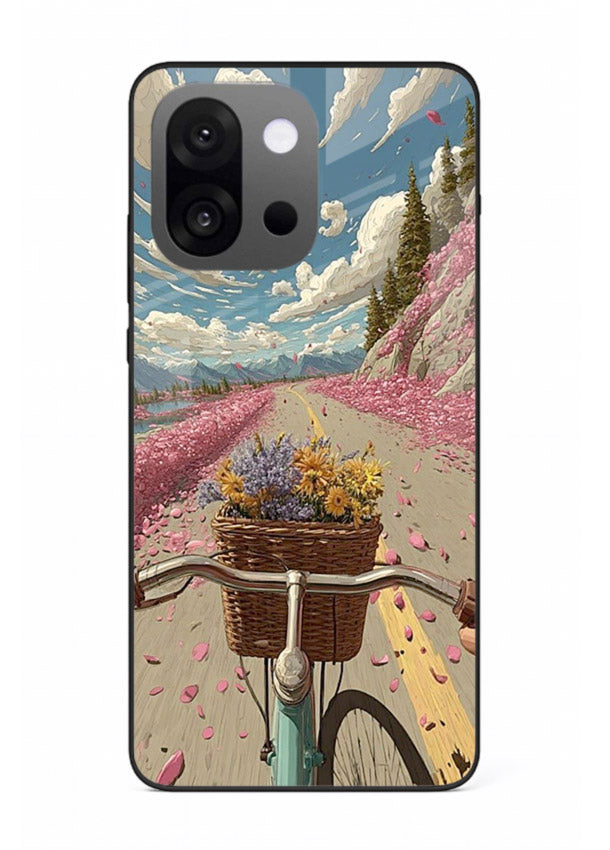 Bicycle with blossom-filled basket artwork on OnePlus 13s glass back cover with soft scenic floral detailing.