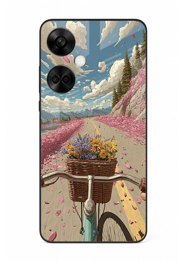 Bicycle with blossom-filled basket artwork on OnePlus Nord CE3 glass back cover with soft scenic floral detailing.