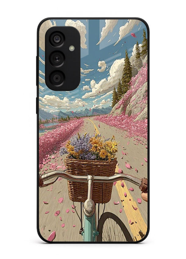 Bicycle with blossom-filled basket artwork on Samsung M14 5G glass back cover with soft scenic floral detailing.