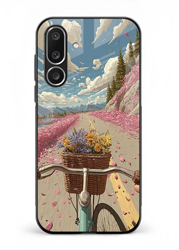 Bicycle with blossom-filled basket artwork on Samsung F56 5G glass back cover with soft scenic floral detailing.
