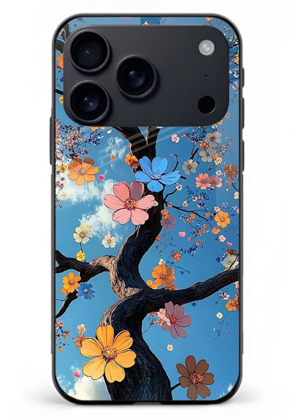 Blue blossom branch artwork on iphone 18 pro max glass back cover with cool botanical tones.