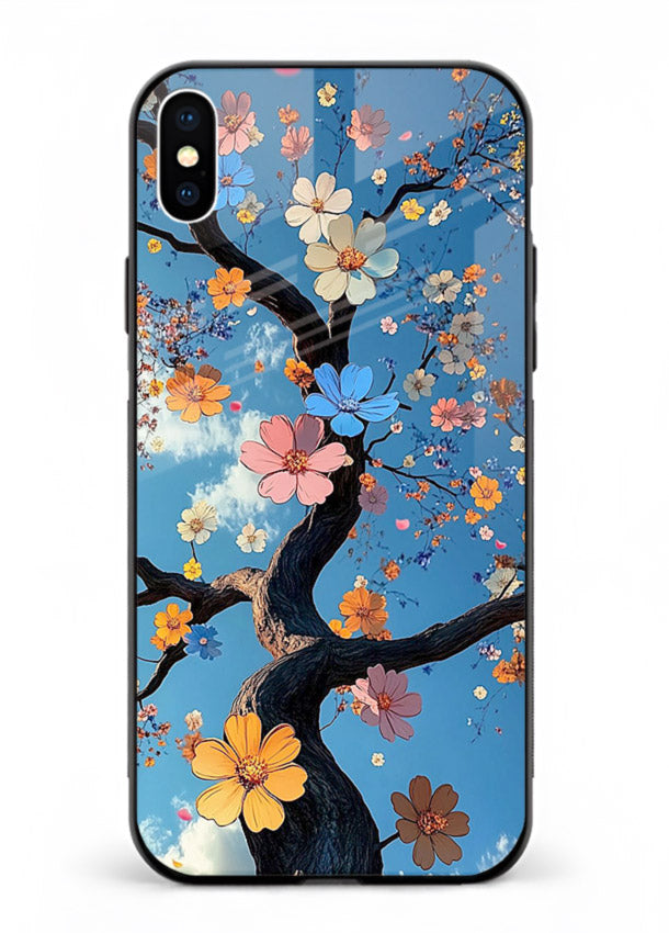 Blue blossom branch artwork on iphone xs max glass back cover with cool botanical tones.