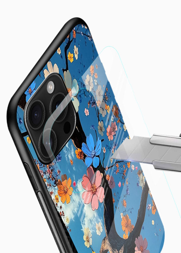 Blue blossom branch artwork on glossy vibrant premium glass back cover with cool botanical tones. - Angle Blade