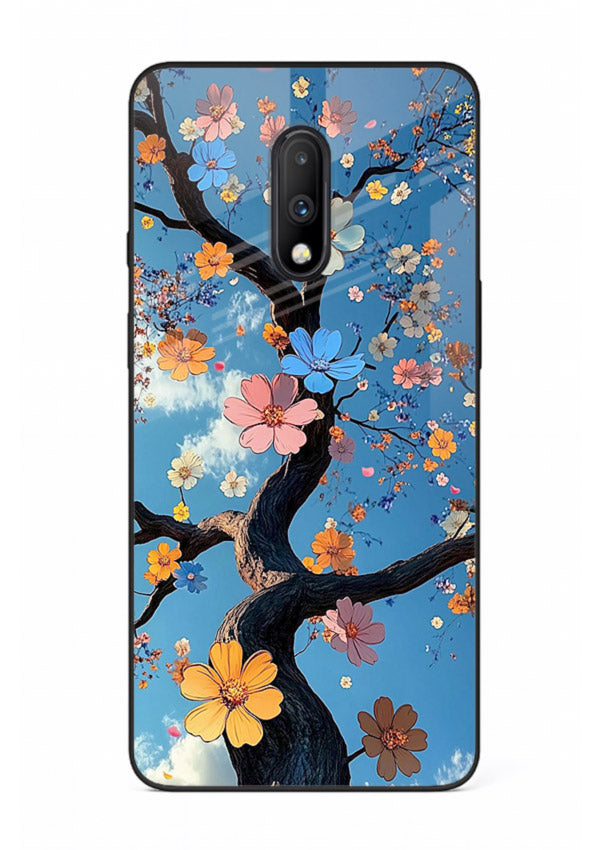 Blue blossom branch artwork on OnePlus 7 glass back cover with cool botanical tones.