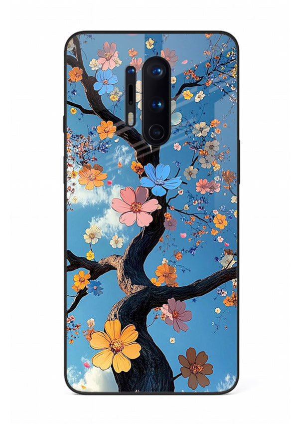 Blue blossom branch artwork on OnePlus 8 Pro glass back cover with cool botanical tones.