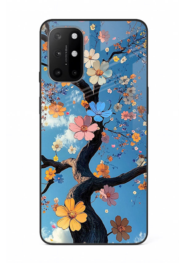 Blue blossom branch artwork on OnePlus 8T glass back cover with cool botanical tones.