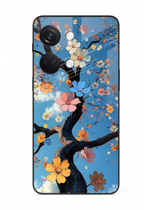 Blue blossom branch artwork on OnePlus Nord 3 glass back cover with cool botanical tones.