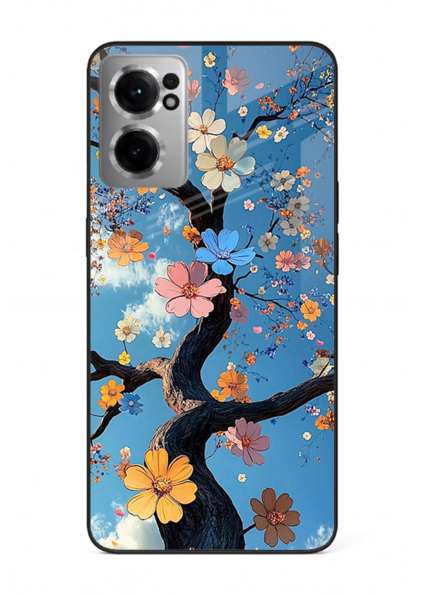 Blue blossom branch artwork on OnePlus Nord CE2 5G glass back cover with cool botanical tones.
