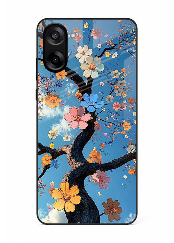 Blue blossom branch artwork on OnePlus Nord CE5 glass back cover with cool botanical tones.