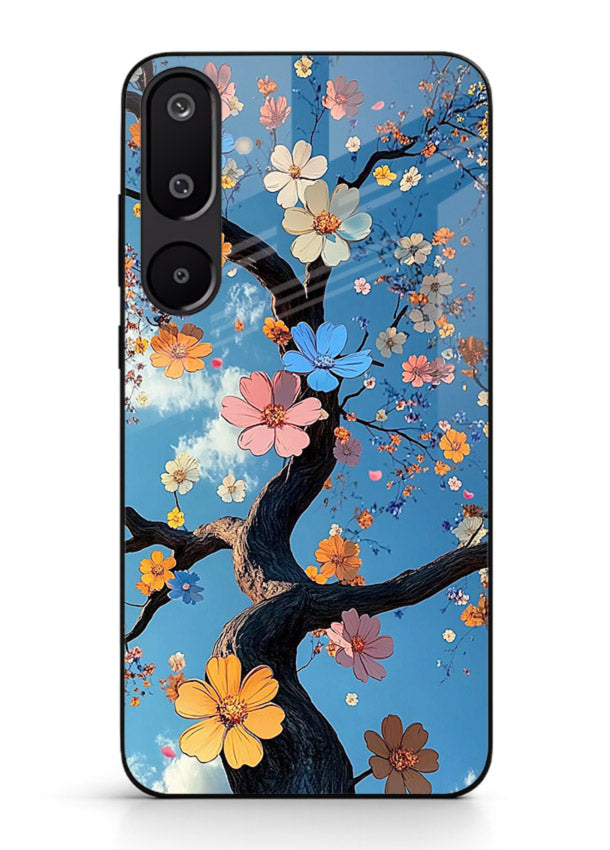 Blue blossom branch artwork on Samsung F16 5G glass back cover with cool botanical tones.