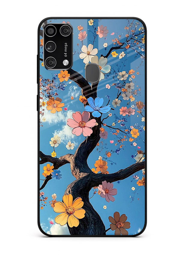 Blue blossom branch artwork on Samsung M31 Prime glass back cover with cool botanical tones.