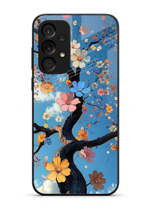 Blue blossom branch artwork on Samsung A33 5G glass back cover with cool botanical tones.