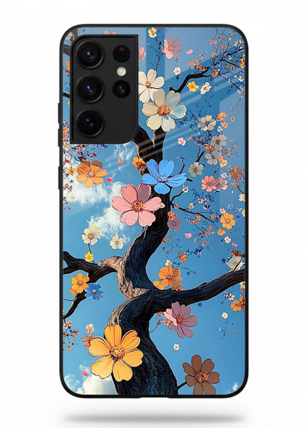 Blue blossom branch artwork on Samsung S21 Ultra glass back cover with cool botanical tones.
