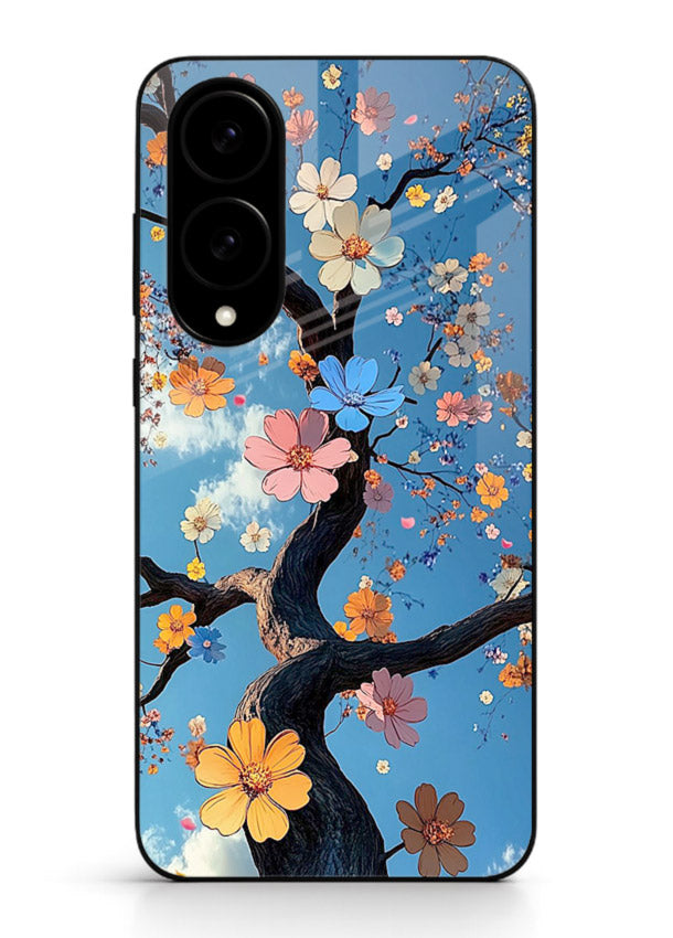 Blue blossom branch artwork on Samsung S25 Edge glass back cover with cool botanical tones.