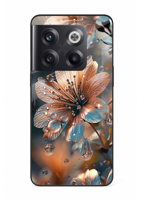 Blue-orange floral bloom artwork on OnePlus 10T glass back cover with vivid contrasting petals.