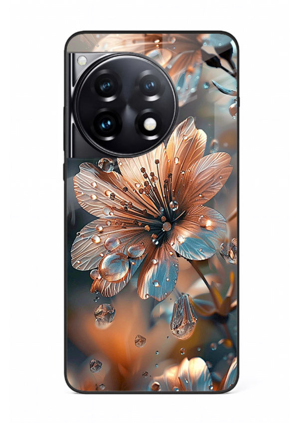 Blue-orange floral bloom artwork on OnePlus 12R glass back cover with vivid contrasting petals.