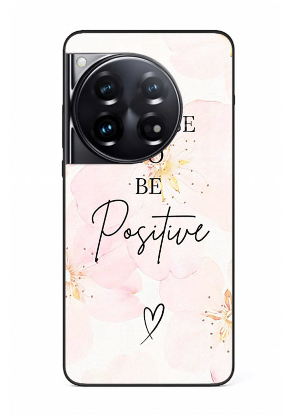 Blush floral motivational artwork printed on OnePlus 12 glass back cover in soft tones.