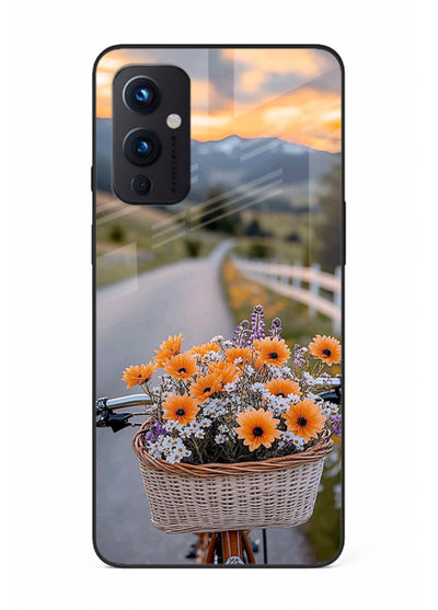 Country floral basket artwork on OnePlus 9 Pro glass back cover with rustic botanical tones.