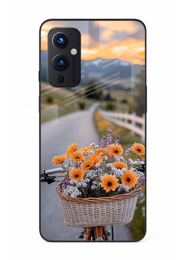 Country floral basket artwork on OnePlus 9 Pro glass back cover with rustic botanical tones.