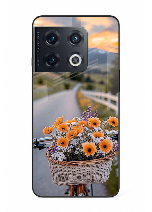 Country floral basket artwork on OnePlus 10 Pro glass back cover with rustic botanical tones.