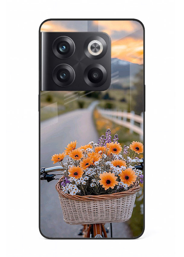 Country floral basket artwork on OnePlus 10T glass back cover with rustic botanical tones.