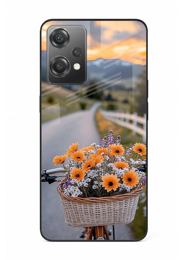 Country floral basket artwork on OnePlus Nord CE2 Lite 5G glass back cover with rustic botanical tones.