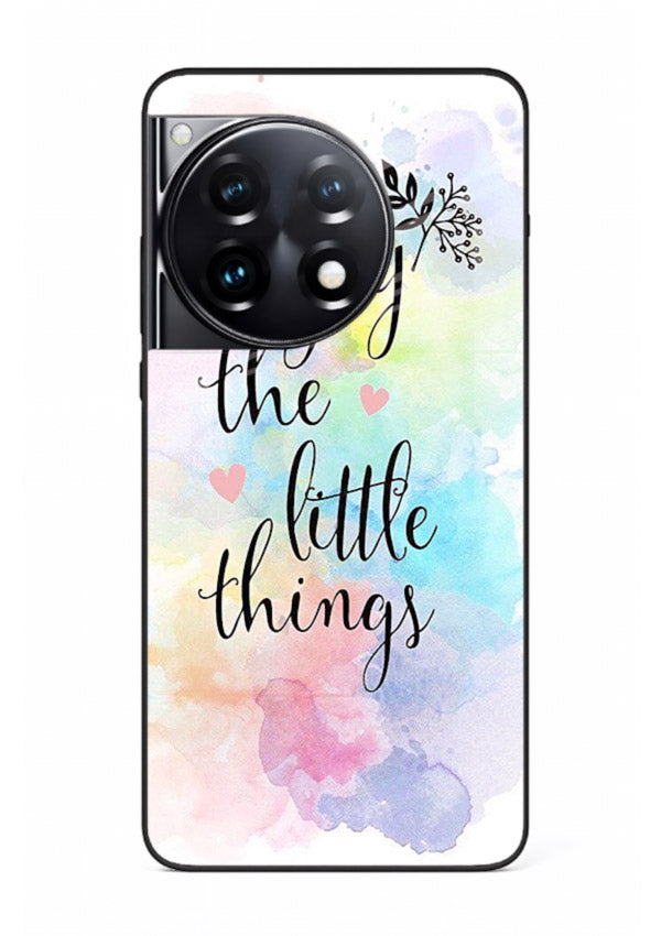 Watercolor splash quote printed on OnePlus 12R glass back cover with colorful soft tones.