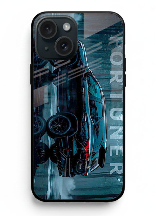Toyota Fortuner SUV in dark blue reflective setting with bold stance for iPhone 15 Plus