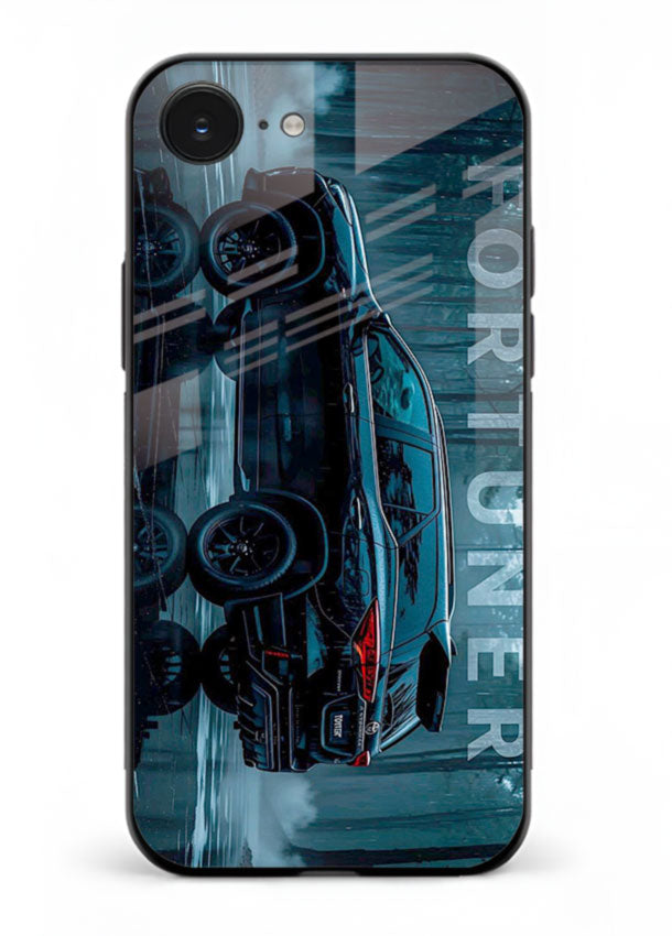 Toyota Fortuner SUV in dark blue reflective setting with bold stance for iPhone 16E