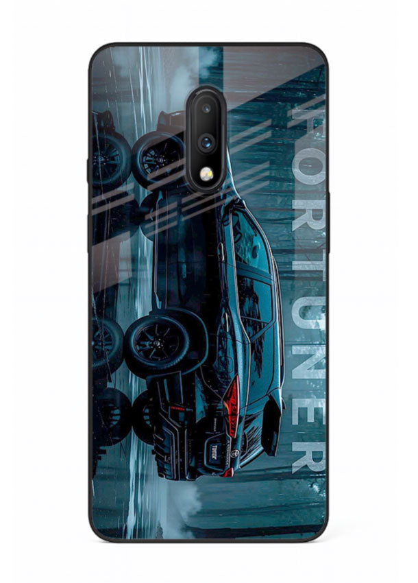 Toyota Fortuner SUV in dark blue reflective setting with bold stance for OnePlus 7