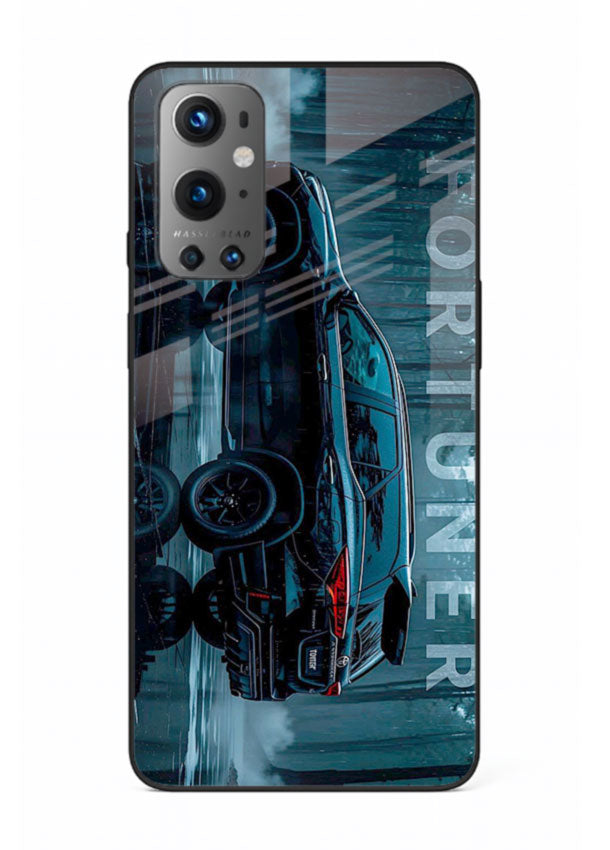 Toyota Fortuner SUV in dark blue reflective setting with bold stance for OnePlus 9