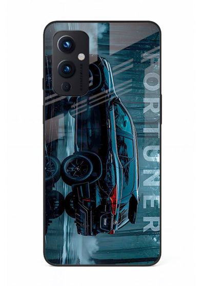 Toyota Fortuner SUV in dark blue reflective setting with bold stance for OnePlus 9 Pro