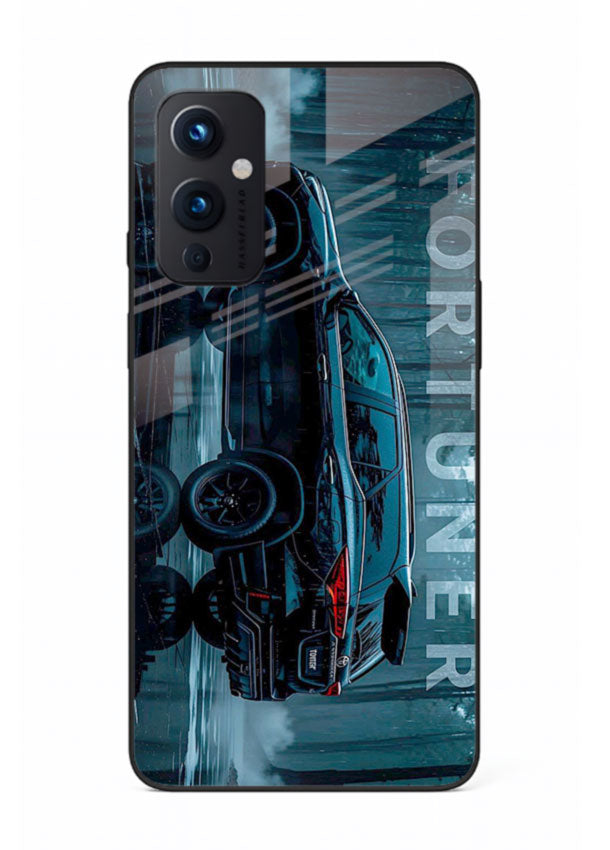 Toyota Fortuner SUV in dark blue reflective setting with bold stance for OnePlus 9 Pro