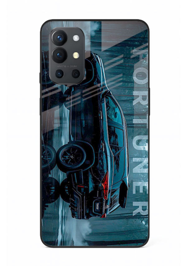 Toyota Fortuner SUV in dark blue reflective setting with bold stance for OnePlus 9R