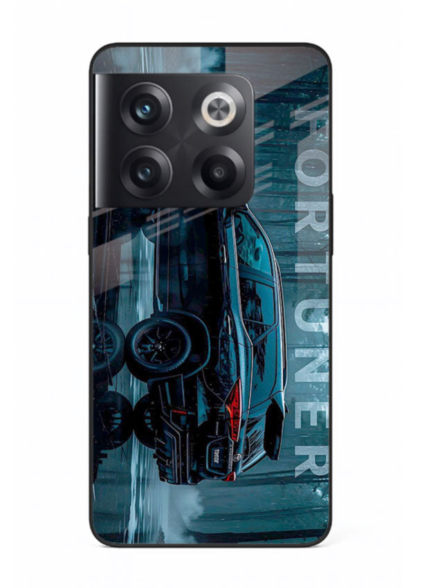 Toyota Fortuner SUV in dark blue reflective setting with bold stance for OnePlus 10T