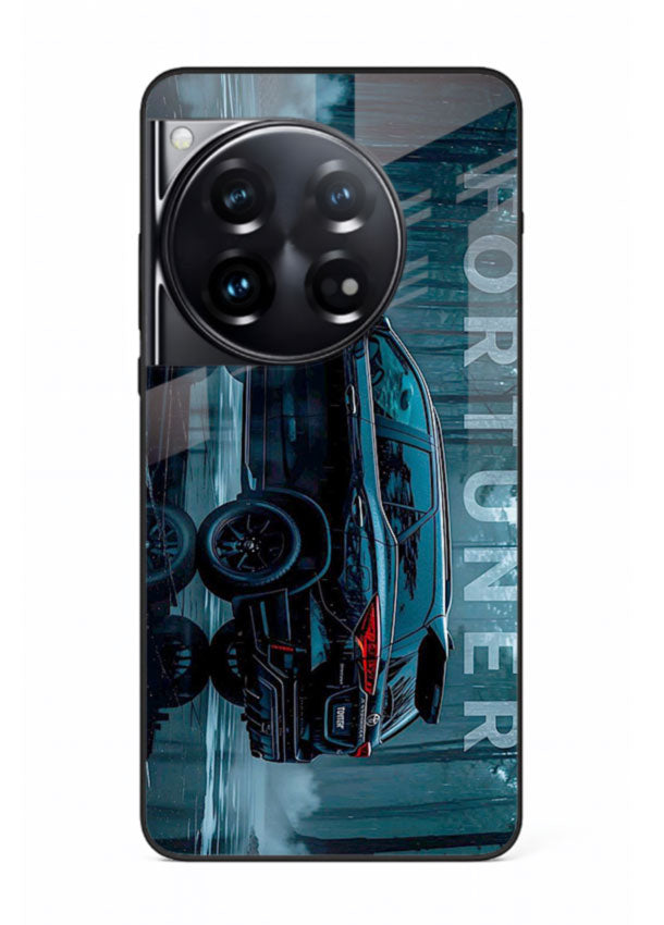 Toyota Fortuner SUV in dark blue reflective setting with bold stance for OnePlus 12