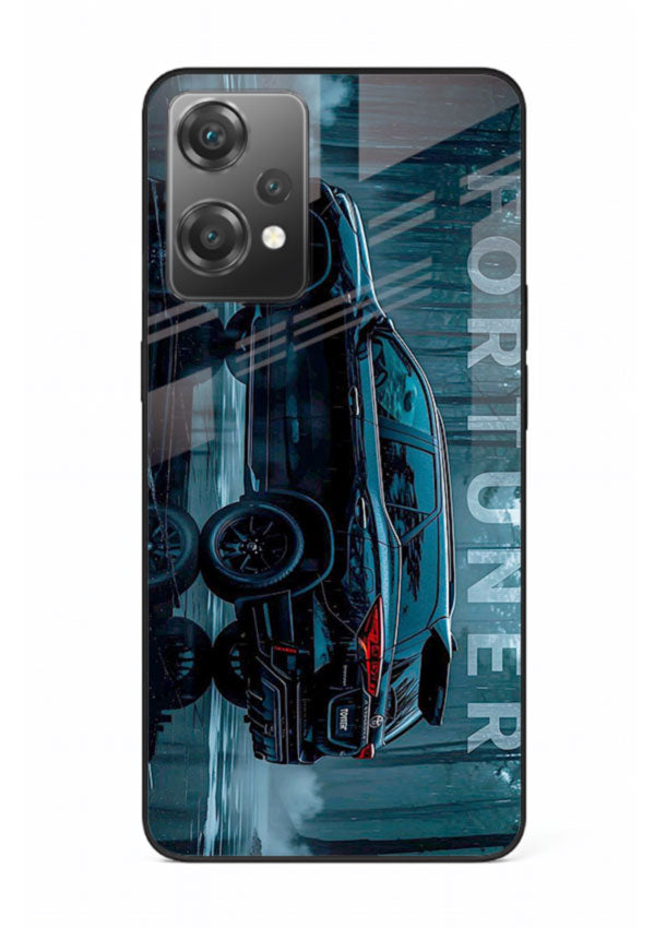 Toyota Fortuner SUV in dark blue reflective setting with bold stance for OnePlus Nord CE2 Lite 5G
