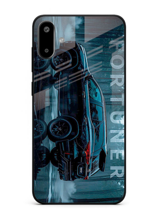 Toyota Fortuner SUV in dark blue reflective setting with bold stance for Samsung F06 5G