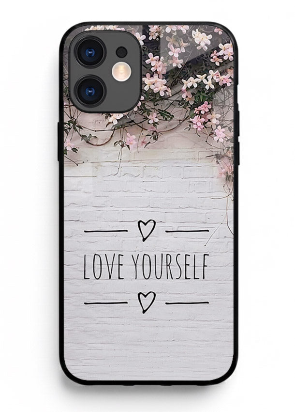 Floral self-love message printed on iphone 12 mini glass back cover with gentle pastel tones.