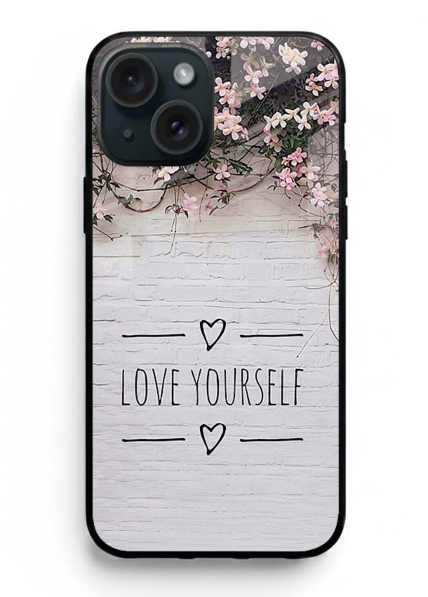 Floral self-love message printed on iphone 15 plus glass back cover with gentle pastel tones.
