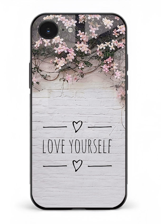 Floral self-love message printed on iphone 16e glass back cover with gentle pastel tones.