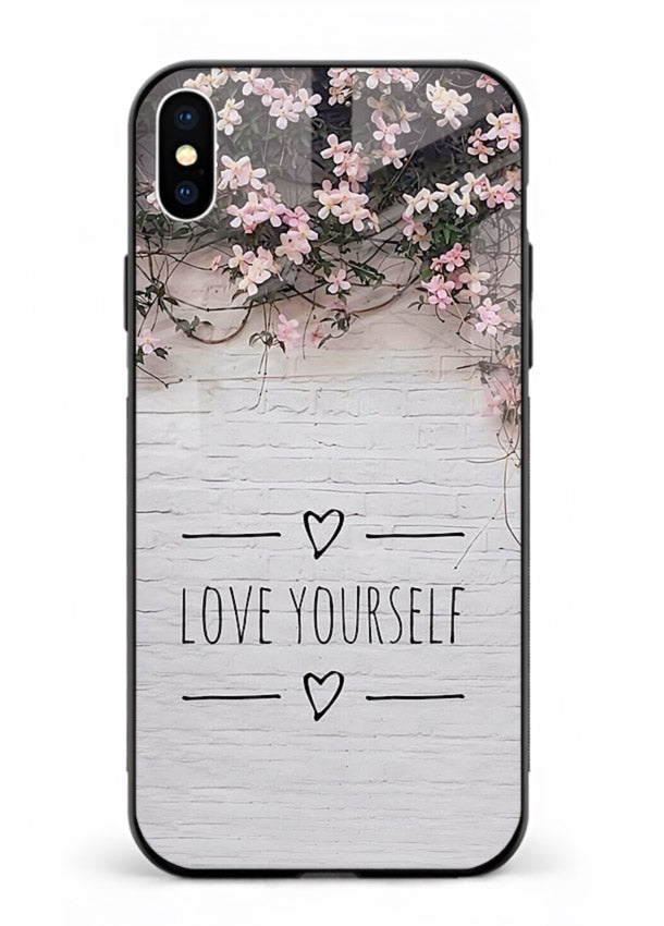 Floral self-love message printed on iphone xs max glass back cover with gentle pastel tones.